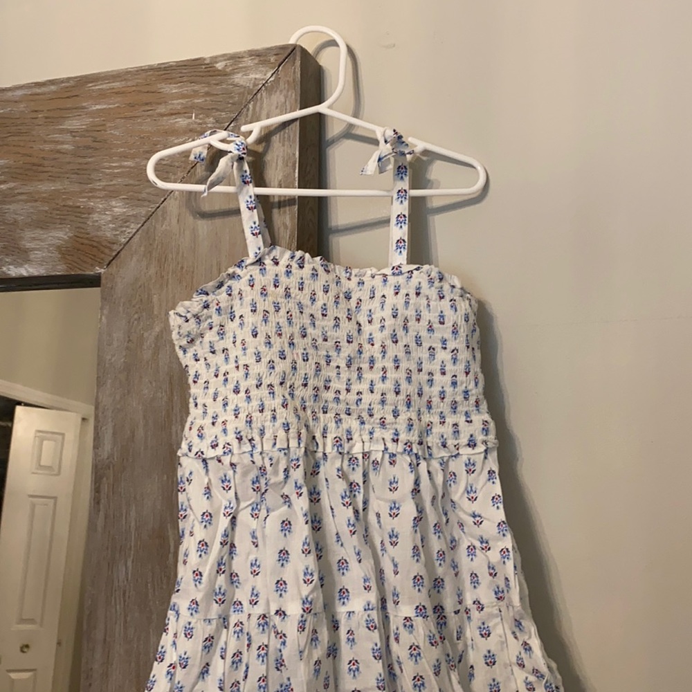 Kids dress in a size 8. Multicolored. New with tags.